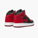 Tênis Jordan 1 Mid GS Banned